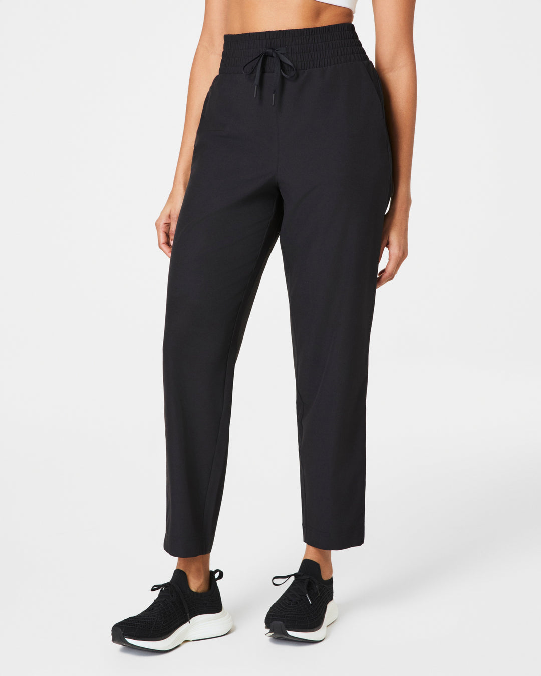 SPANX® On The Move Slim Pant in Very Black